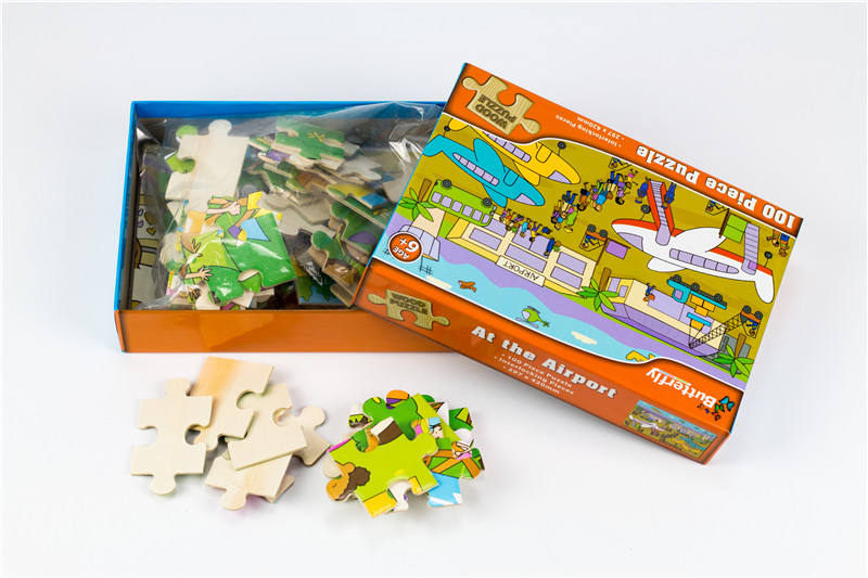 Rompecabezas de bebé de 60 piezas con patrón de dinosaurio de dibujos animados para niños con caja de embalaje de color de huevos de dinosaurio