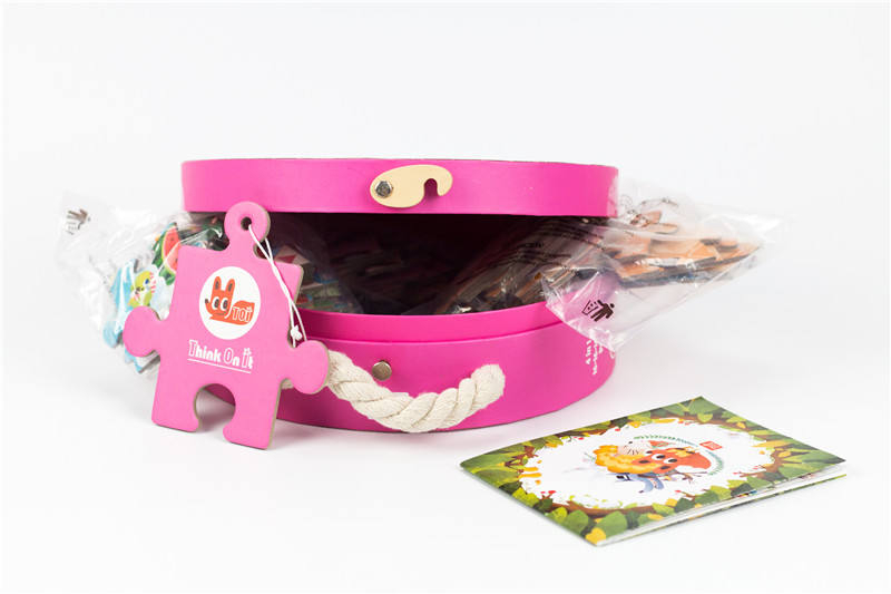 Venta caliente personalizar diferentes formas de embalaje cilindro 300 500 1000 1500 piezas rompecabezas para adultos y niños