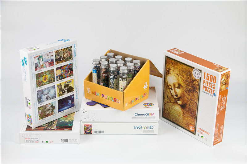 Venta caliente personalizar diferentes formas de embalaje cilindro 300 500 1000 1500 piezas rompecabezas para adultos y niños